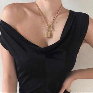 Vintage reworked Louis Vuitton lock necklace